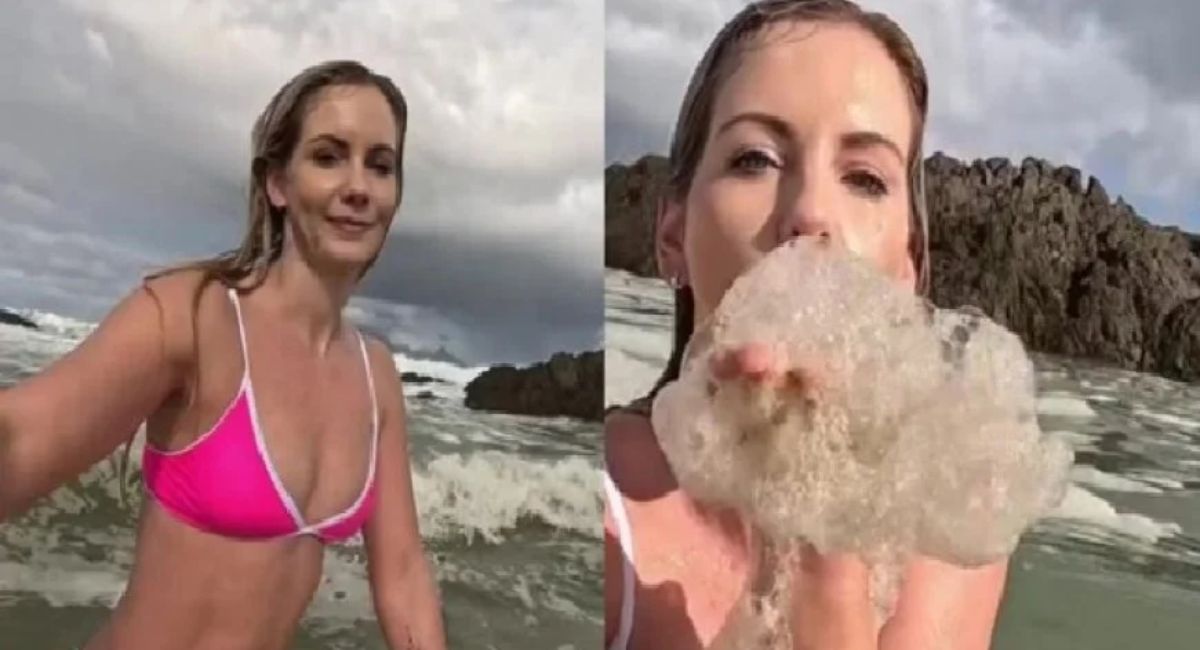 Influenciadora gera polêmica ao tomar banho em praia com espuma de esgoto na África do Sul
