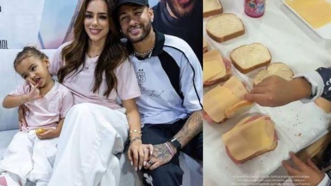 Filha de Neymar distribui lanches a pessoas em situação de rua