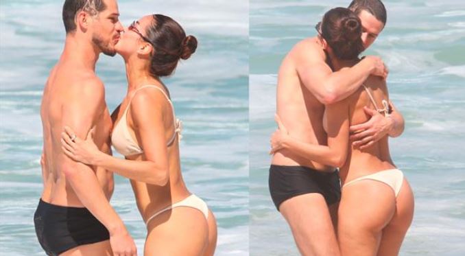 José Loreto e Nanda Marques trocam beijos em praia no Rio